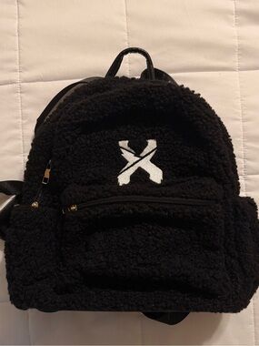 Excision fuzzy backpack